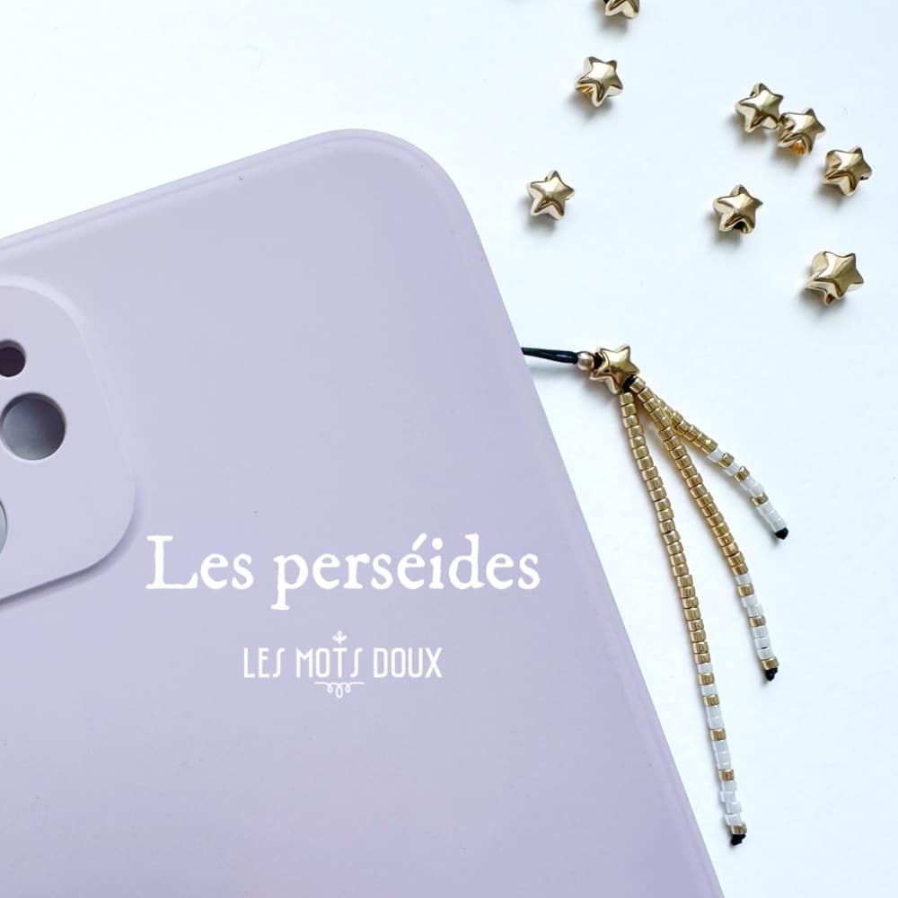 Charm de portable "Les perséides" : blanc neige