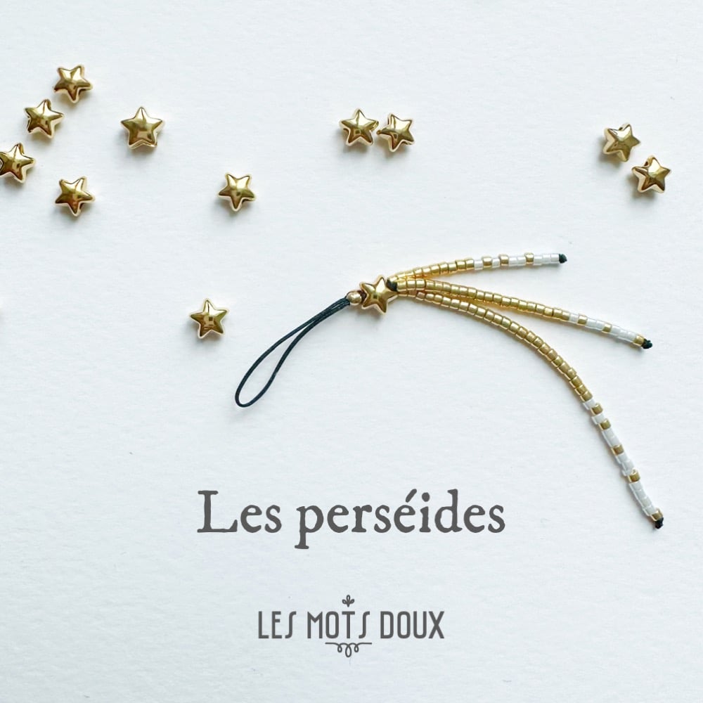 Charm de portable "Les perséides" : blanc neige